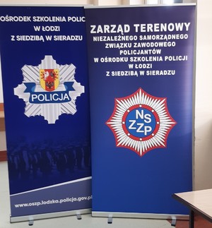 Baner policyjny oraz związków zawodowych.